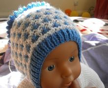 Шапочка для новорожденного спицами