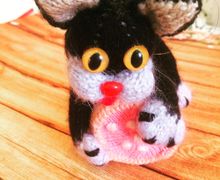 Игрушка котик с колбаской