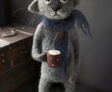 Кот с чашкой кофе