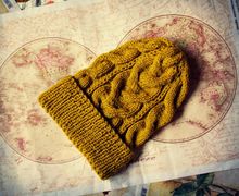 Модная шапка с косами