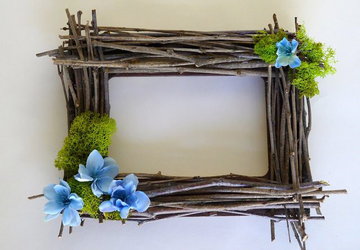 Оригинальная рамка для фотографий своими руками из веток.