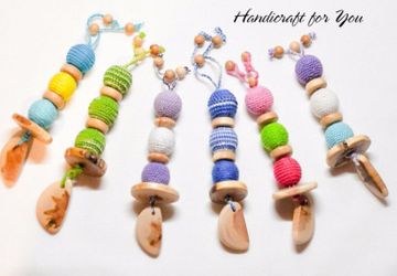 Грызунки-погремушки из можжевеловых бусин  в ассортименте