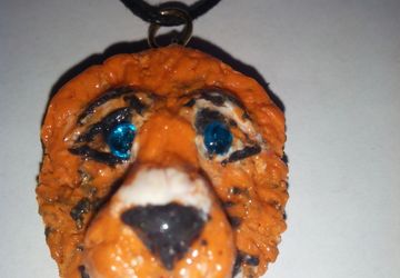 Тотем - кулон лев из глины ( заряженный)