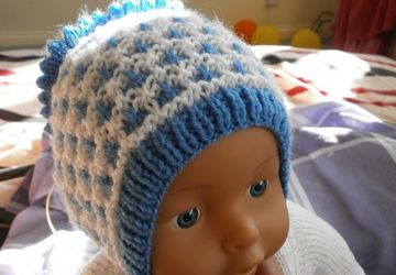 Шапочка для новорожденного спицами
