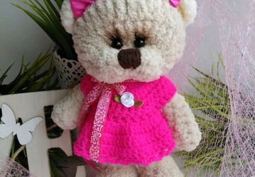 Милая мишка в розовом