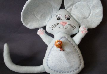 Игрушки, вышитые на машине