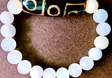 Браслет из оникса с Тибетской бусиной Дзи 9 глаз