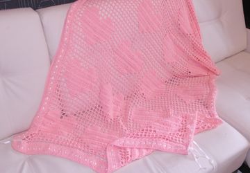 Плед ручной вязки.