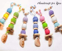 Грызунки-погремушки из можжевеловых бусин  в ассортименте