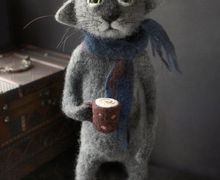 Кот с чашкой кофе