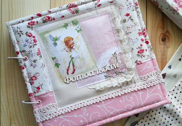 Фотоальбомы,  бэби буки,  блокноты.