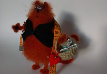 Кот рукодельник