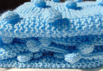 Детский плед с помпонами