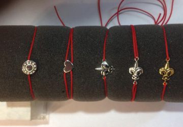 браслеты с красной нитью