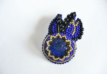 Брошь "Подающая звезда" с лазуритом