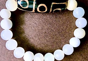 Браслет из оникса с Тибетской бусиной Дзи 9 глаз