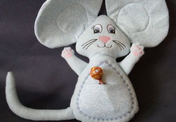 Игрушки, вышитые на машине