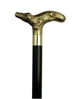 Walking Cane Alligator Black Shaft. This novelty walking stick cane has a solid brass handle, 1" hardwood shaft, and 36 inches long size. This wood cane has a weight capacity of 250 pounds.