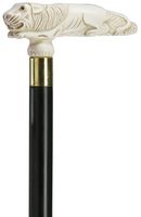 Walking Cane - Ladies white antique lion-high impact durable plastic handle, black wood shaft, 36" long with rubber tip.