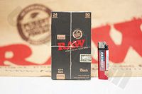 Bundle - 2 Items Full Box/24 Packs of Raw Black 1 1/4 Rolling Papers and Patriot Disposable Lighter