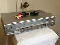 Go-Video DV2150 DVD/VCR Video Cassette Recorder / DVD Player COMBO. 4-Head Hi-Fi Stereo VHS & CD Player. Dolby Digital Sound, CD Digital Out, Progressive Scan, MP3 Player. No Remote. WORKS GREAT!