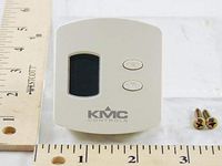 Temperature sensor/transmitter with LCD display, override, and adjustable setpoint