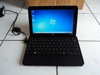 HP Mini 110-1025DX, 10.1" Black Netbook, Intel Atom CPU @ 1.67 GHz, 160 GB HDD, 1.0 GB RAM, No DVD Drive, WiFi, Webcam, Windows 7 Starter (32 Bit), Microsoft Office 2007 Full Version