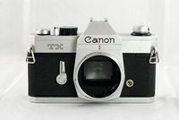 Canon TX SLR manual focus film camera body; no lens