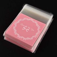 Baost 100Pcs Bowknot Candy Bags Self Adhesive OPP Cookie Bakery Decorating Bags Biscuit Roasting Plastic Bag DIY Decorative Party Goody Treat Bags Candy Package Cellophane Gift Bag Pink