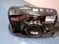 Olympus Infinity Zoom 210 Quartz Date 35mm Film Camera W/Zoom AF Viariable Power Flash w/ Olympus Lens Zoom 38-76mm Camera(Black Color)