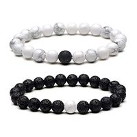 Reizteko 2pcs Yin and Yang Elastic Lava Stone Essential Oil Diffuser Black Matt White Howlite Bracelet (matt)