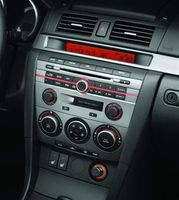 Genuine Mazda BS3F-79-BGX CD/MP3 Changer Trim Panel