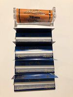 Zig Zag Cigarrete Rolling Paper Ultra Thin 1 1/4. Four Packs + Zig Zag Roller.