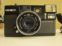 Minolta Hi-Matic AF2 Auto Focus 35mm Film Flash Camera w/ Minolta Lens 38mm 1:2.8 (46mm)