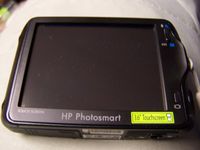 HP Photosmart R937 8MP Digital Camera with 3x Optical Zoom
