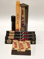 Raw Black King Size Rolling Paper (3 Packs) Raw Original Tips (2 Packs) Raw Wide Tips (1 Pack) Plus Raw Roller 110MM, Raw Black Clipper and Large DoobTube.