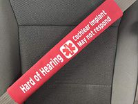 Hard of Hearing/Cochlear Medical Alert Seat Belt Cover (Ruby Red)