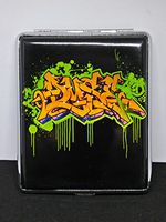 DyseOne Orange Graffiti Silver Framed PU Leather 100s Cigarette Case
