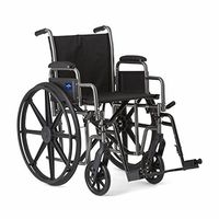 Medline Strong and Sturdy Wheelchair with Desk-Length Arms and Swing-Away Leg Rests for Easy Transfers, 20” Seat