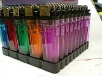 Wholesale Disposable Lighters - Pack of 50 with Stand New Spark Wheel Safety System, Adjustable Flame,by Liberty.