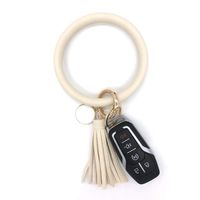 simpleGURU Bracelet Keychain with Tassel Leather Wristlet Keychain Bangle Key Ring Bracelet for Women and Girls (Cream)