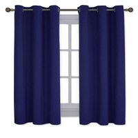 NICETOWN All Season Thermal Insulated Solid Grommet Top Blackout Curtains/Drapes/Panels for Kid's Room (Navy Blue, 1 Pair, 42 x 63 Inch)