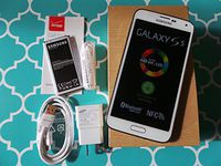 Straight Talk Samsung Galaxy S5. Use Verizon Towers on Straight Talk. (White)