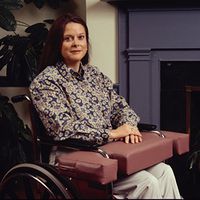 Lap Pillow with cutouts. 2" thick, fits standard 18" or 22" wheelchairs; color: blue