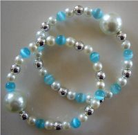 Queasy Beads® ~ Two (2) Authentic Stylish Motion Sickness Anti Nausea Acupressure Bracelets in Delicate Turquoise ~ Genuine, High Quality Turquoise Blue Cat's Eye, White and Sterling Silver Beads