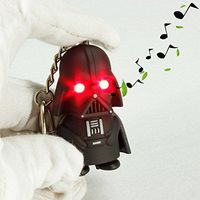 Darth Vader Light Up Key Chain - Tough Black Rubber Plastic Construction With Push Button Helmet to Activate Evil LED Eyes