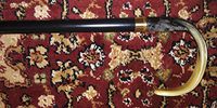 Walking Cane-Flat nose. This walking stick cane has an imported genuine horn handle. This walking aid has a black ebony tapered shaft. This horn handle cane has a weight capacity of 250 pounds and 36 inch shaft