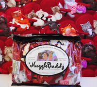 'NUGGLEBUDDY Moist Heat & Aromatherapy Organic Rice Pack for Microwave. Cold Pack. MOVIE CATS Fabric. Cute, Cute, Cute! UNSCENTED. See Over 100 Additional 'NuggleBuddy Selections by Searching for NUGGLEBUDDY under "All Departments."