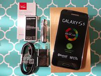 Straight Talk Samsung Galaxy S5. Use Verizon Towers on Straight Talk. (Black)