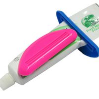 2 pcs Creative Tube Toothpaste Rolling Squeezer Toothpaste Winder Dispenser(Random Color)